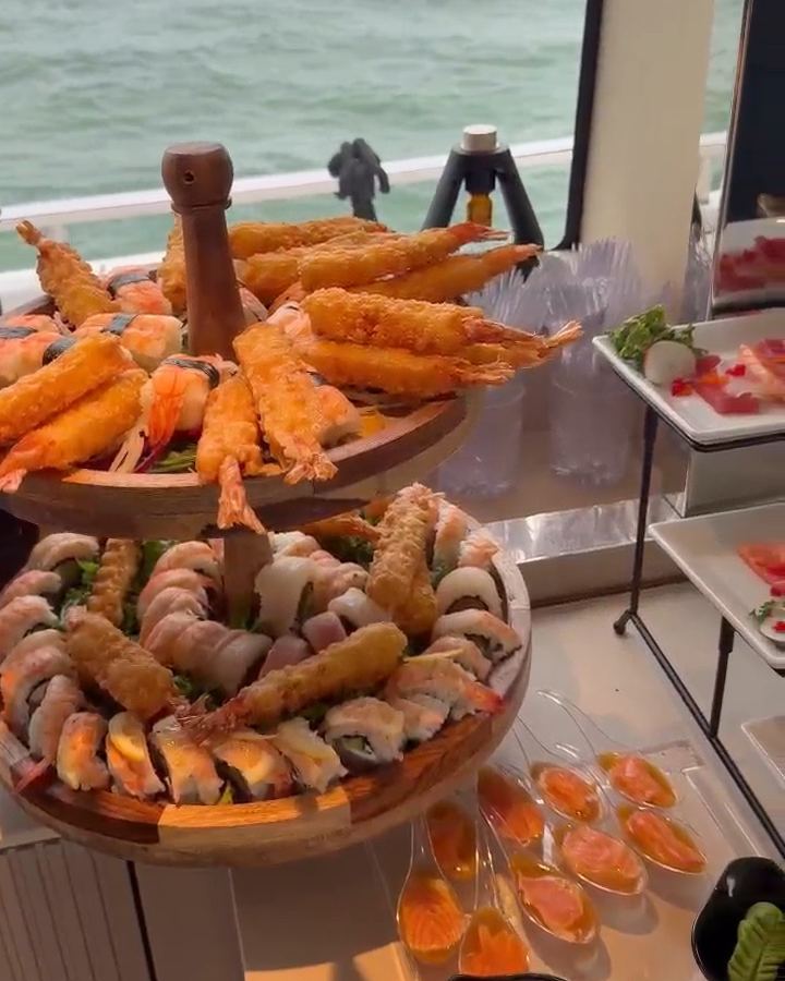 Fried shrimp tower and sashimi at a Zamuru yacht event